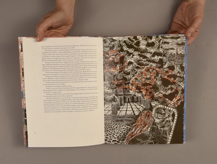 Powieść "Szare Ziemie" z grafikami w formie ilustracji